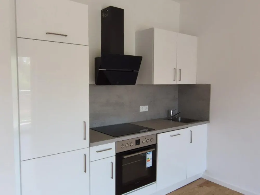Modern 1-Room Apartment with Balcony, First Occupancy 2026 in the Center