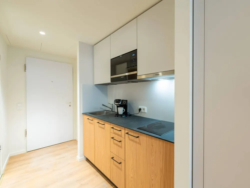 Topmodernes und vollmöbliertes Studioapartment im Neubau-Erstbezug