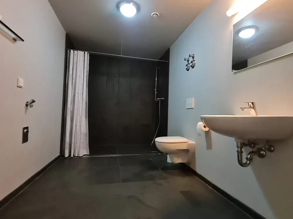 Living in the modern listed building, 1.5-room apartment with terrace and cellar!
