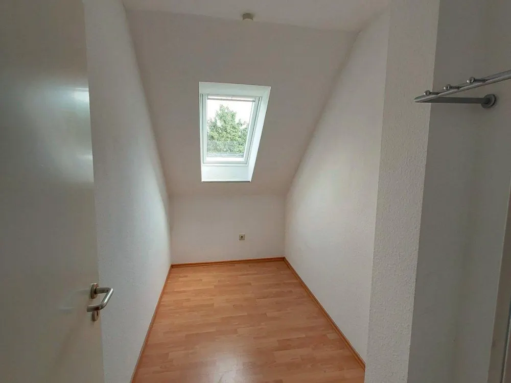 Luftige DG-Wohnung mit Balkon