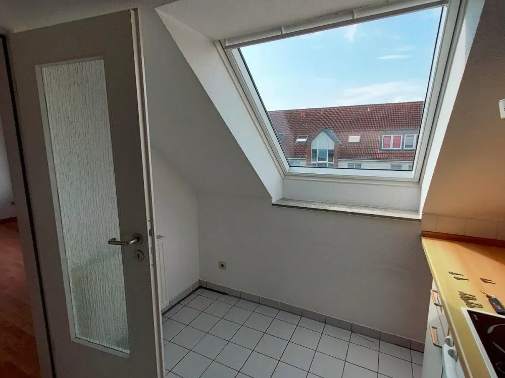 Luftige DG-Wohnung mit Balkon