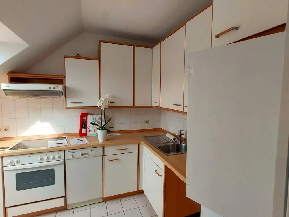 Luftige DG-Wohnung mit Balkon