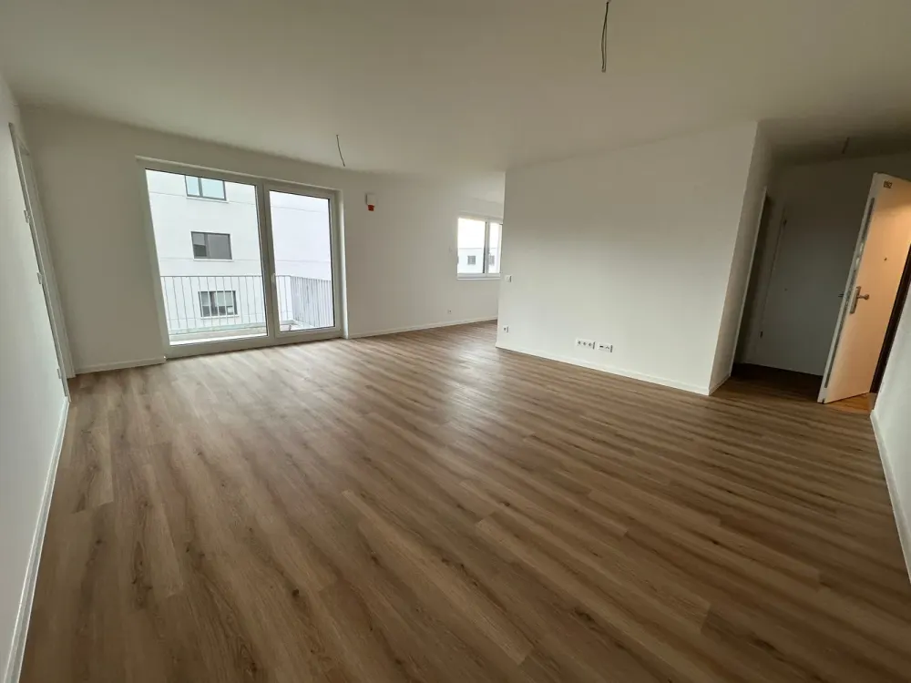 Erstbezug im Neubau - 3 Zimmer Wohnung mit offener Wohnküche, Balkon und Fußbodenheizung