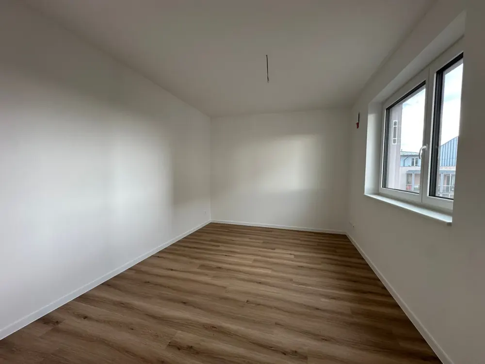Erstbezug im Neubau - 3 Zimmer Wohnung mit offener Wohnküche, Balkon und Fußbodenheizung