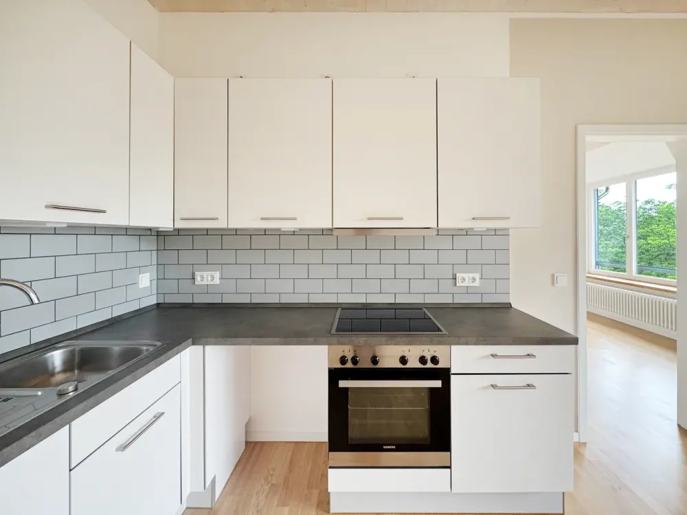 Lichtdurchflutete Dachgeschosswohnung mit privater Aufdachterrasse