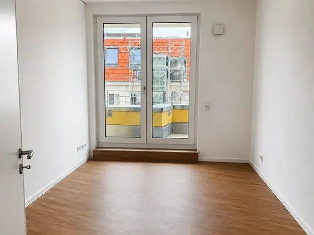 Erstbezug: 2-Zimmer-Neubau-Penthouse mit 21 m² Sonnenterrasse, Einbauküche & Aufzug
