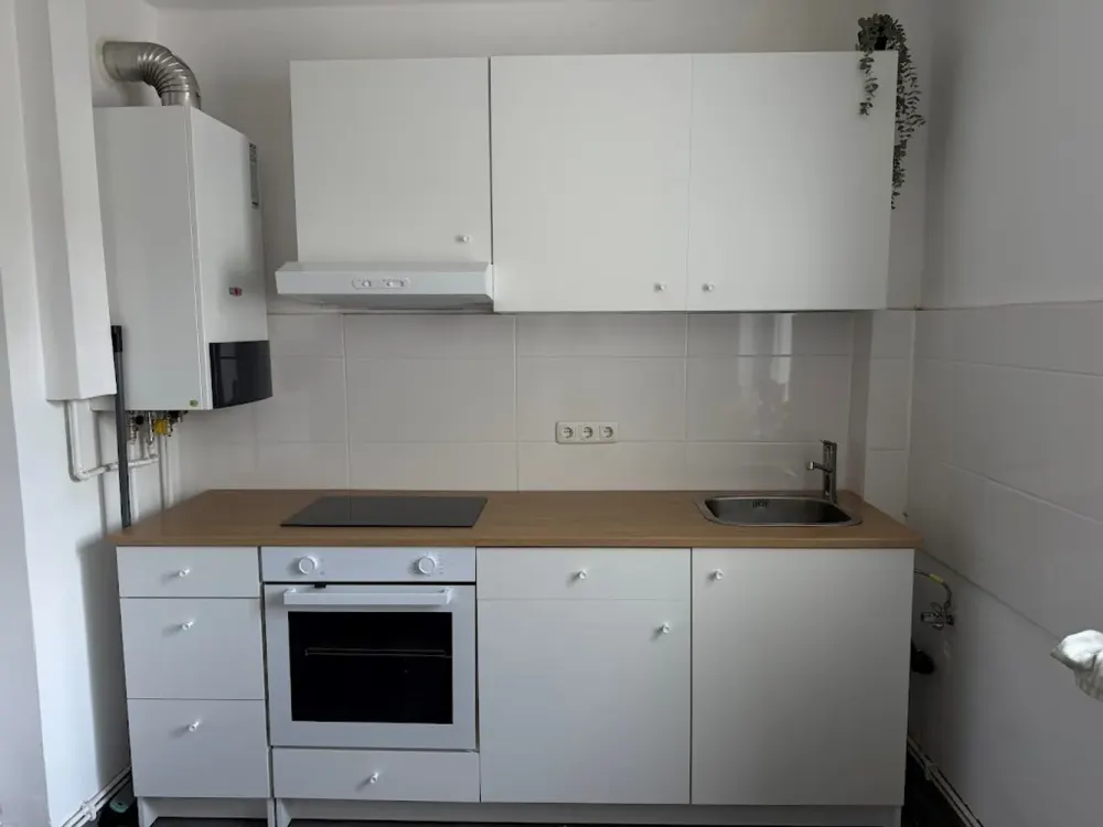 Gemütliche kleine Dachgeschosswohnung mit Einbauküche