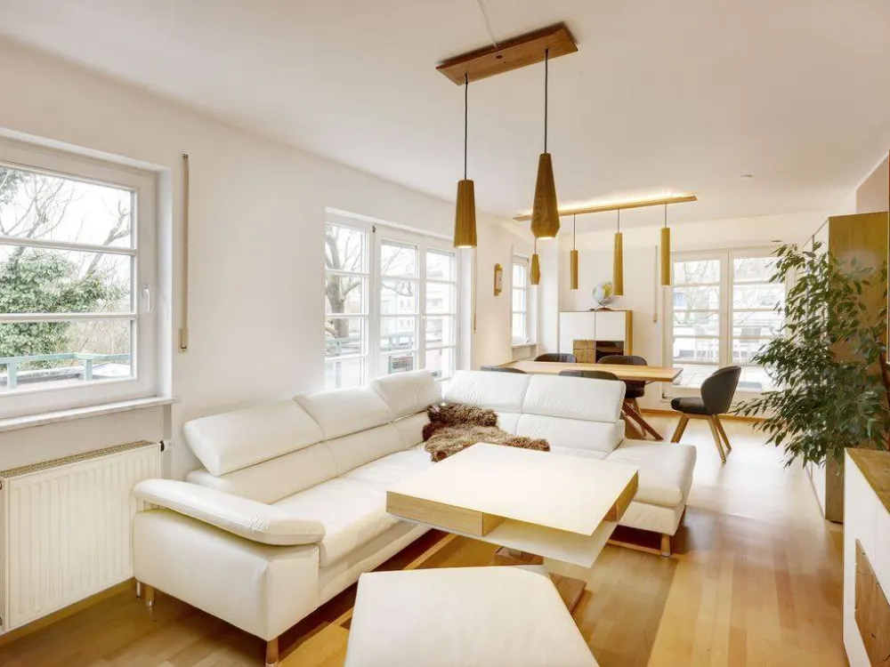 Pasing Süd am Stadtpark: 3-room penthouse with 90 m² net living area, 90 m² roof terrace, elevator to the apartment and underground parking