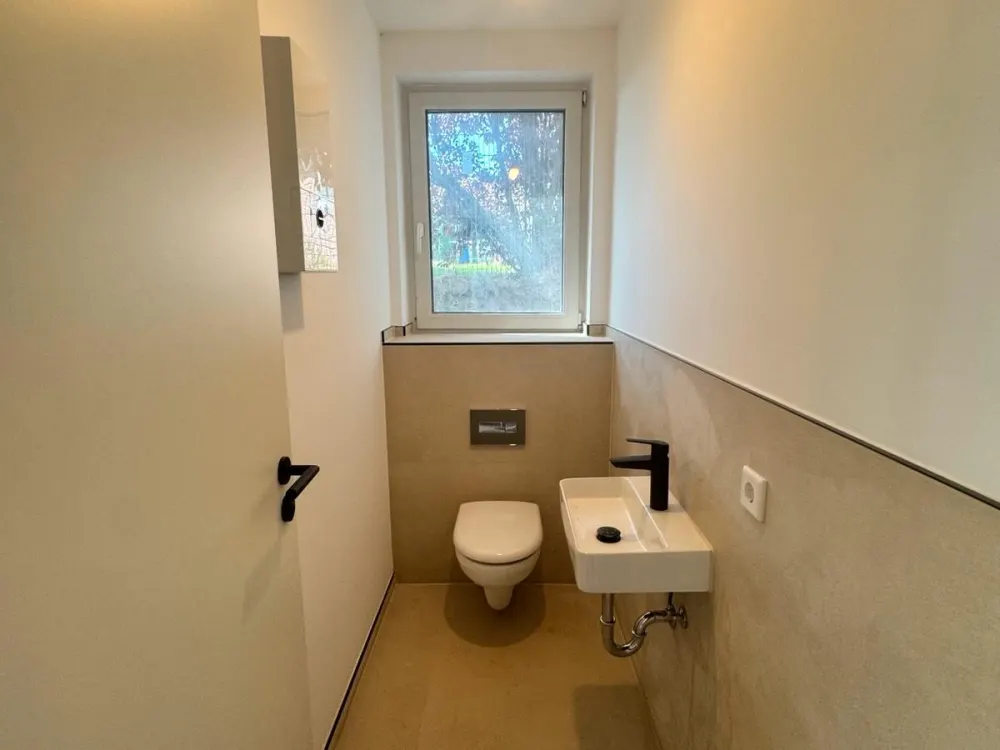 Moderne Neubauwohnung mit Terrasse & Garten