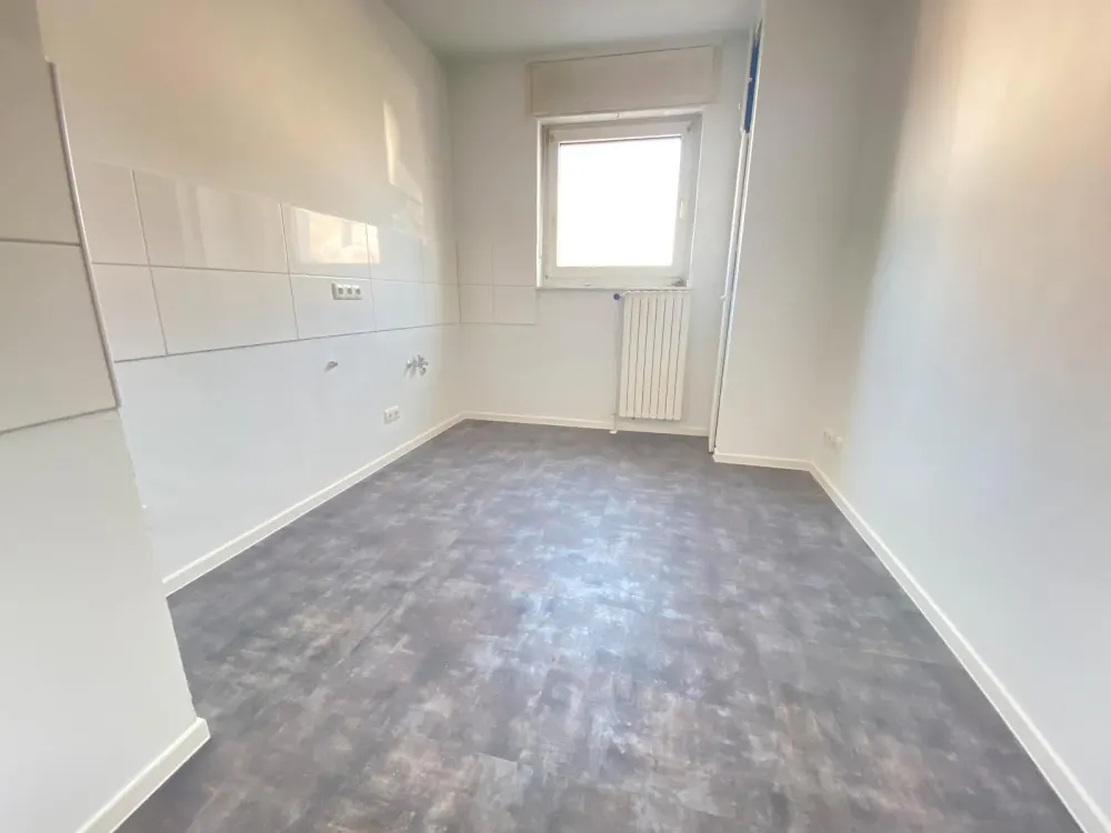Frisch renovierte Erdgeschosswohnung mit Balkon
