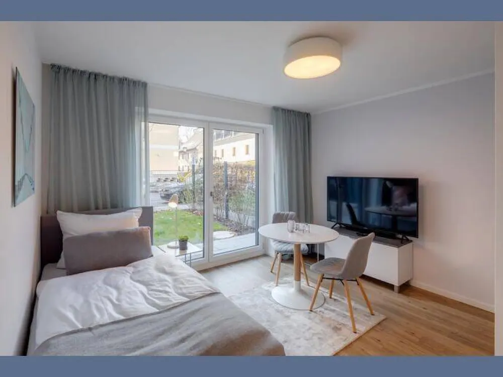 Möbliert: Stilvoll möbliertes Apartment mit Terrasse