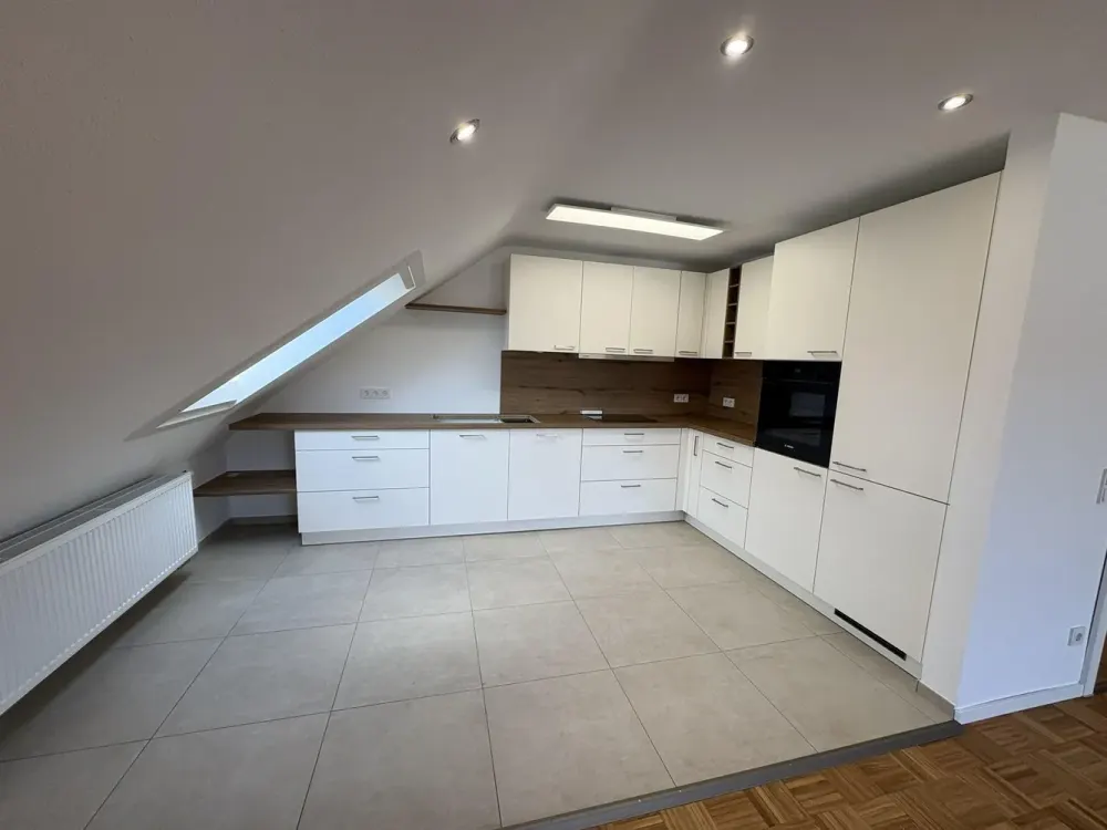 Completely Renovated Attic Apartment in a Quiet Location