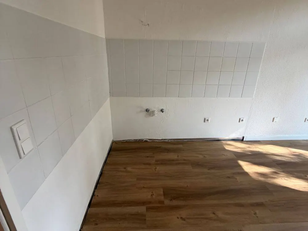 Hochwertig sanierte Altbauwohnung mit 130 m² Privatgarten in Düsseldorf-Rath