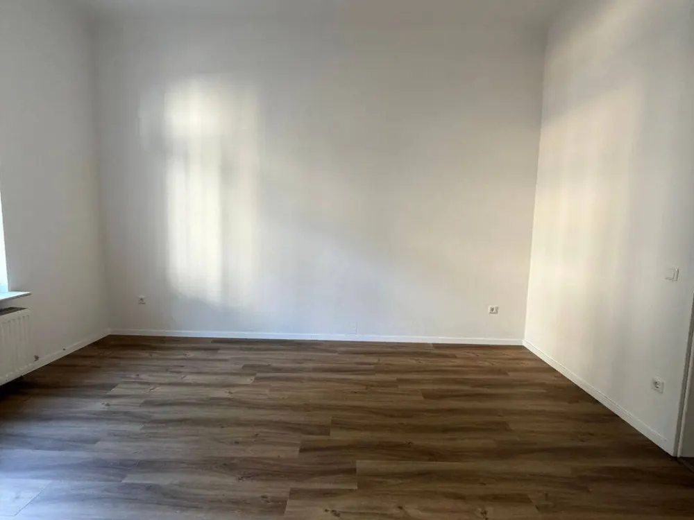 Hochwertig sanierte Altbauwohnung mit 130 m² Privatgarten in Düsseldorf-Rath