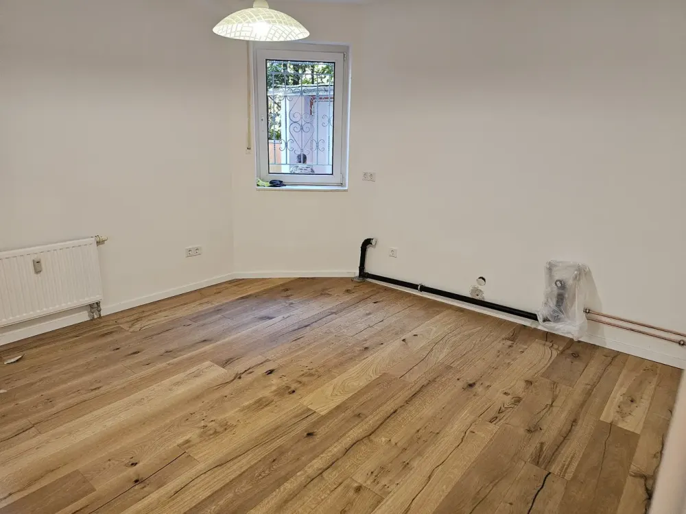 Frisch sanierte Souterrainwohnung in ruhiger Privatstraße, mit Gartennutzung & universitätsnah