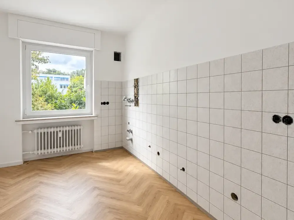 Großzügige 2-Zimmer-Erdgeschosswohnung mit Balkon, direktem Gartenzugang und Garage
