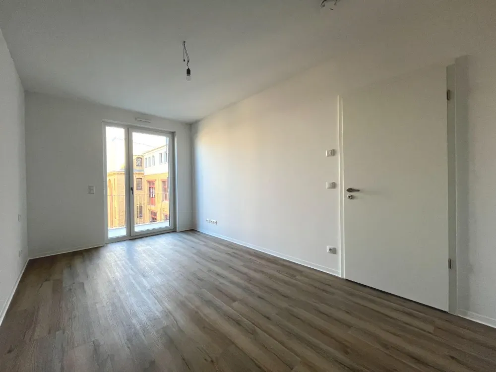 Stilvolle 3-Zimmer-Neubauwohnung mit Balkon und Loggia im Zentrum | Optional mit EBK