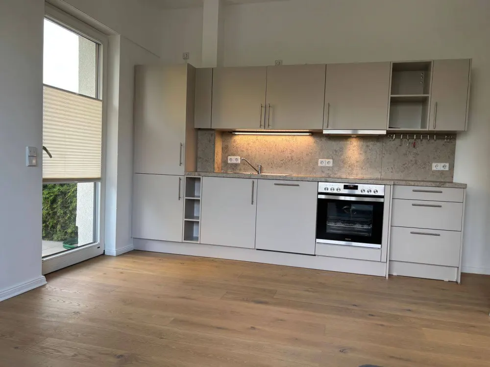 Moderne 2-Zimmer-Terrassenwohnung mit Garten