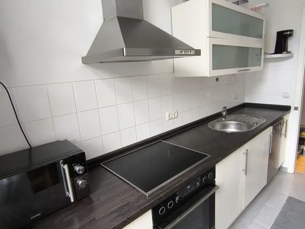 Bright 2-Room Apartment with Balcony & Fitted Kitchen