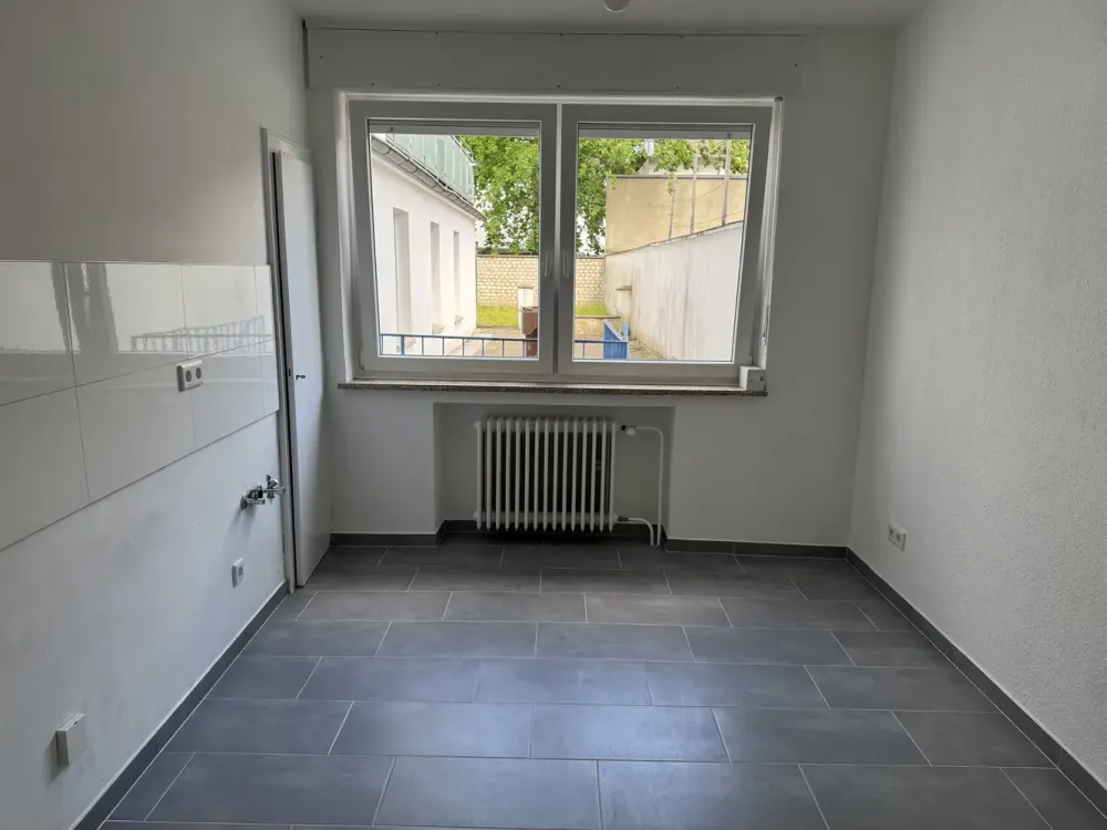 Kernsanierte 1 Zimmerwohnung mit Gartennutzung! Und eine schöne Wohnküche!
