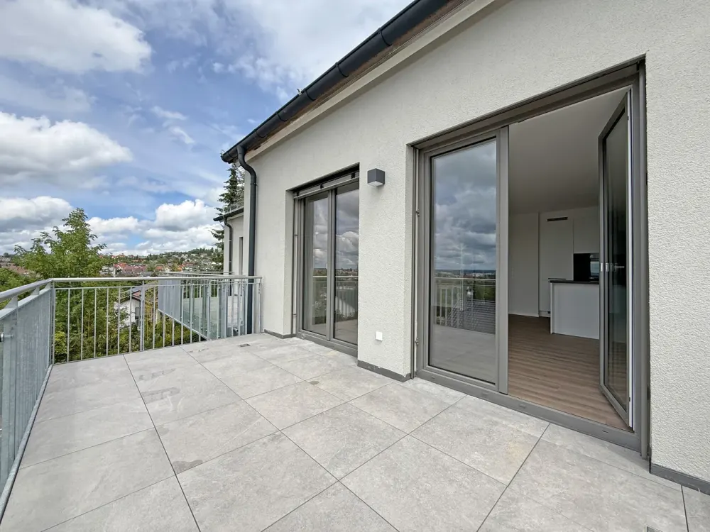 Moderne Neubau-Maisonettewohnung mit Balkon
