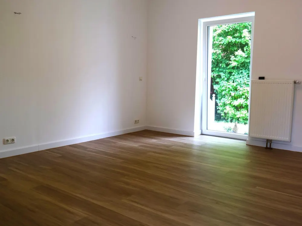 Moderne 105 m² Einliegerwohnung mit Kamin, Einbauküche & Terrasse in Winsen (Luhe)