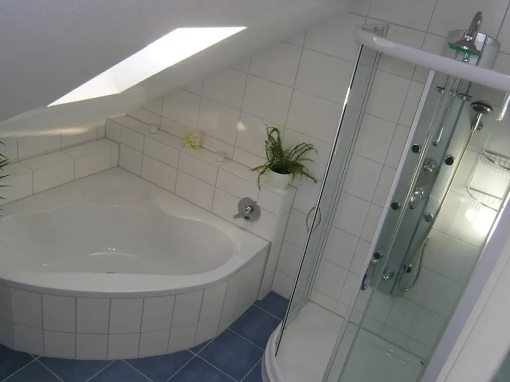 Beautiful 2.5-Room Attic Apartment with Fitted Kitchen, Spacious Bathroom and Partial Mountain View