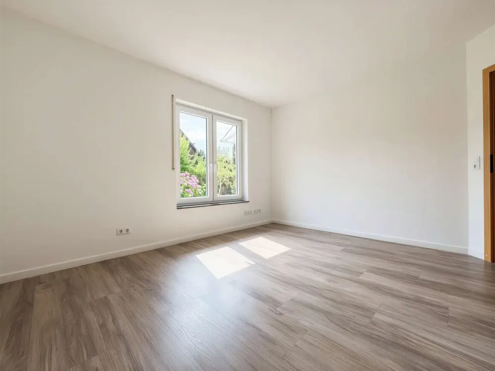 Ruhiges Zuhause mit offenem Wohngefühl: 4-Zimmer-Wohnung mit Kamin und zwei Süd-Terrassen