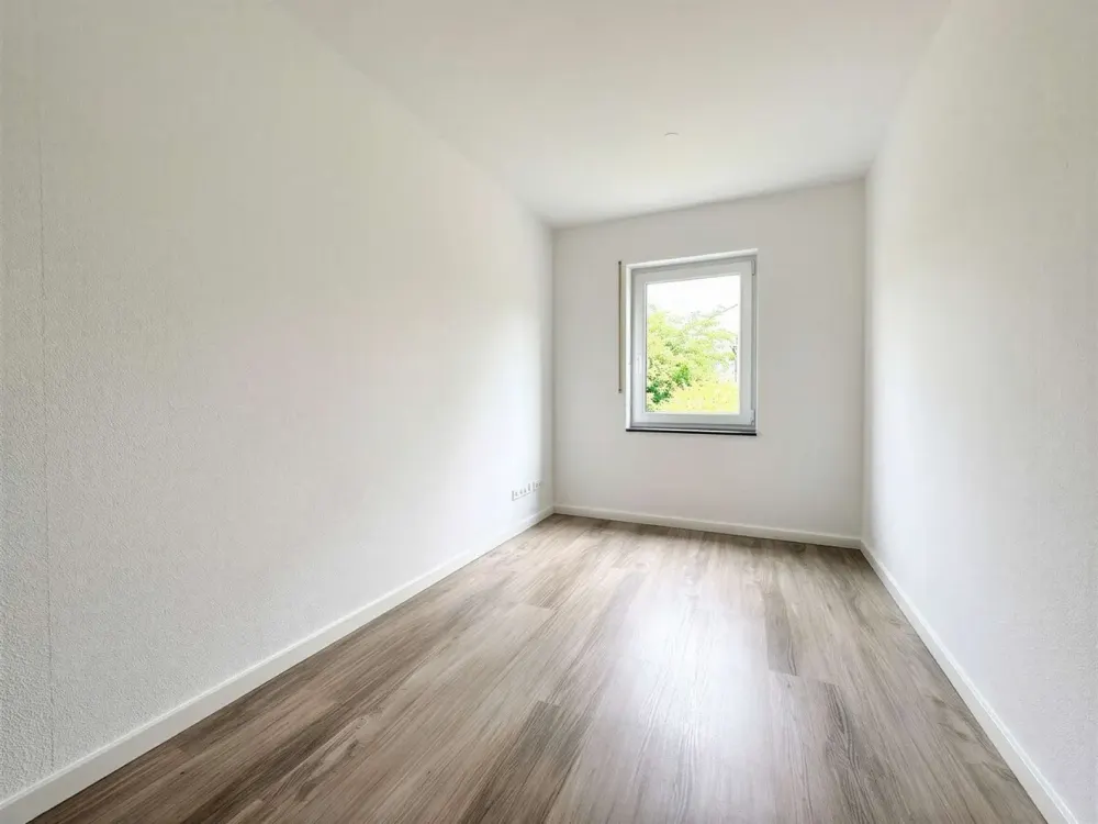 Ruhiges Zuhause mit offenem Wohngefühl: 4-Zimmer-Wohnung mit Kamin und zwei Süd-Terrassen