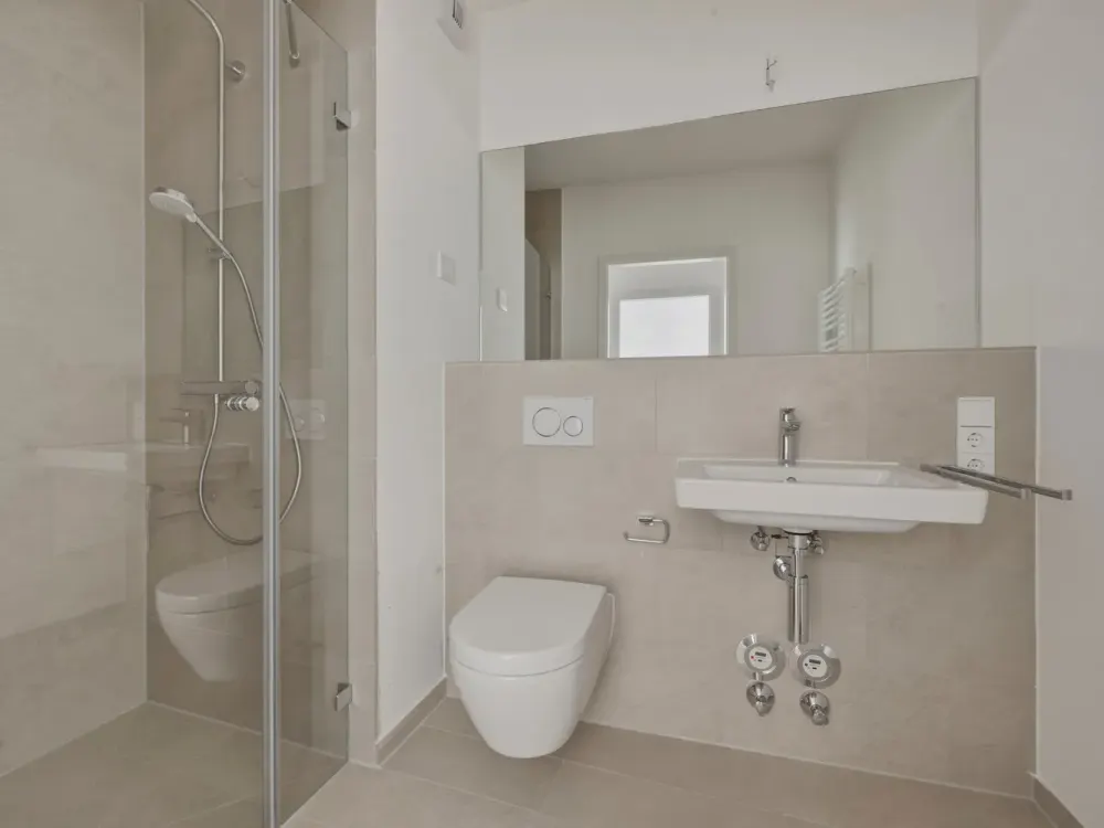 2-Room Attic Apartment with Built-in Kitchen and High-Quality Features