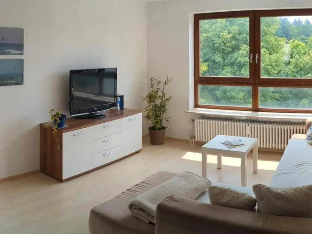 Furnished 2-Room Apartment with Roof Terrace & Parking Space, 49 m²