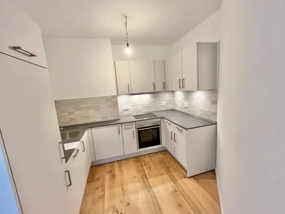 Moderne 1-Zimmer Neubauwohnung (Bj. 2023) für 1 Person mit Balkon und Weitblick