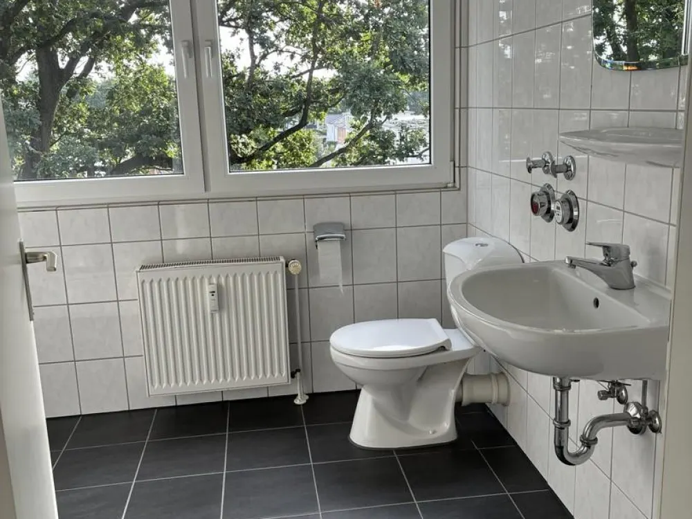 Bright Top-Floor Apartment in a Quiet Location