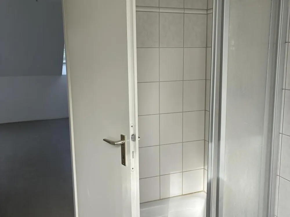 Bright Top-Floor Apartment in a Quiet Location