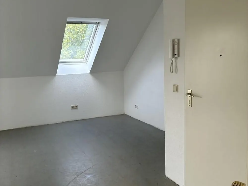 Bright Top-Floor Apartment in a Quiet Location