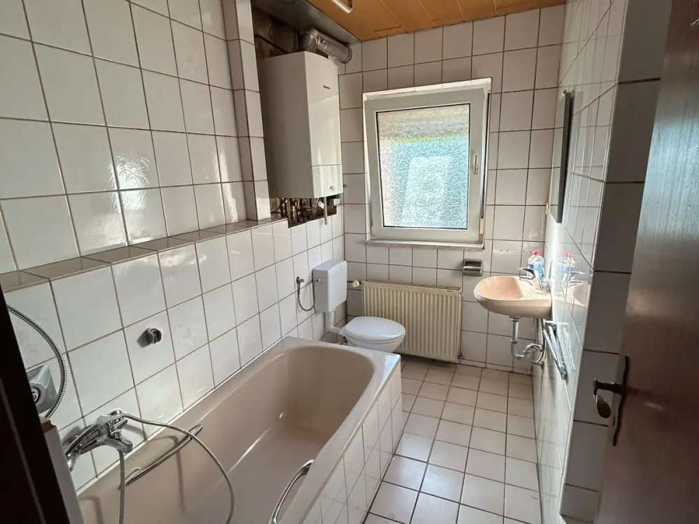 Beautiful, bright 3-room ground floor apartment with balcony in Bous