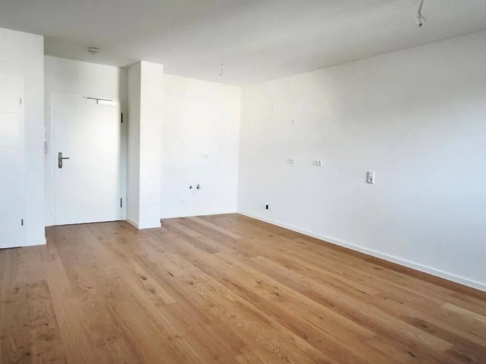 SOFORT EINZIEHEN! Traumhafte 2-Zimmer-DG-Wohnung im Erstbezug + moderner Neubau + Lift + FuBo-Heizung + Parkett + Bäckerei im Haus
