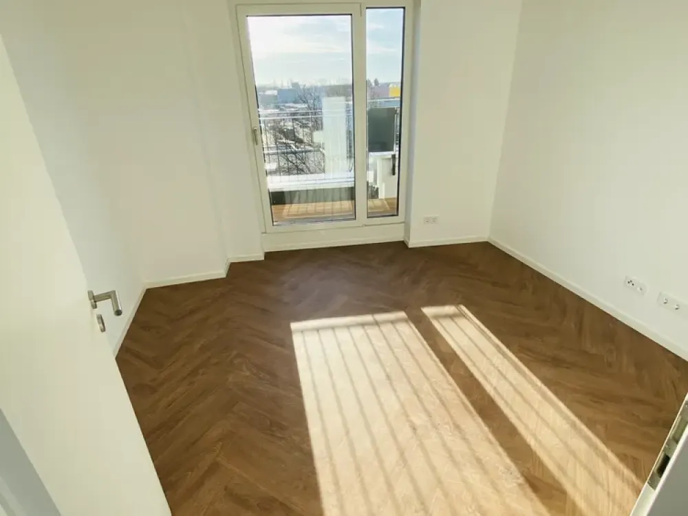 Traumhaftes modernes Wohnen im Dachgeschoss mit EBK und Süd-West-Ost Ausblick!