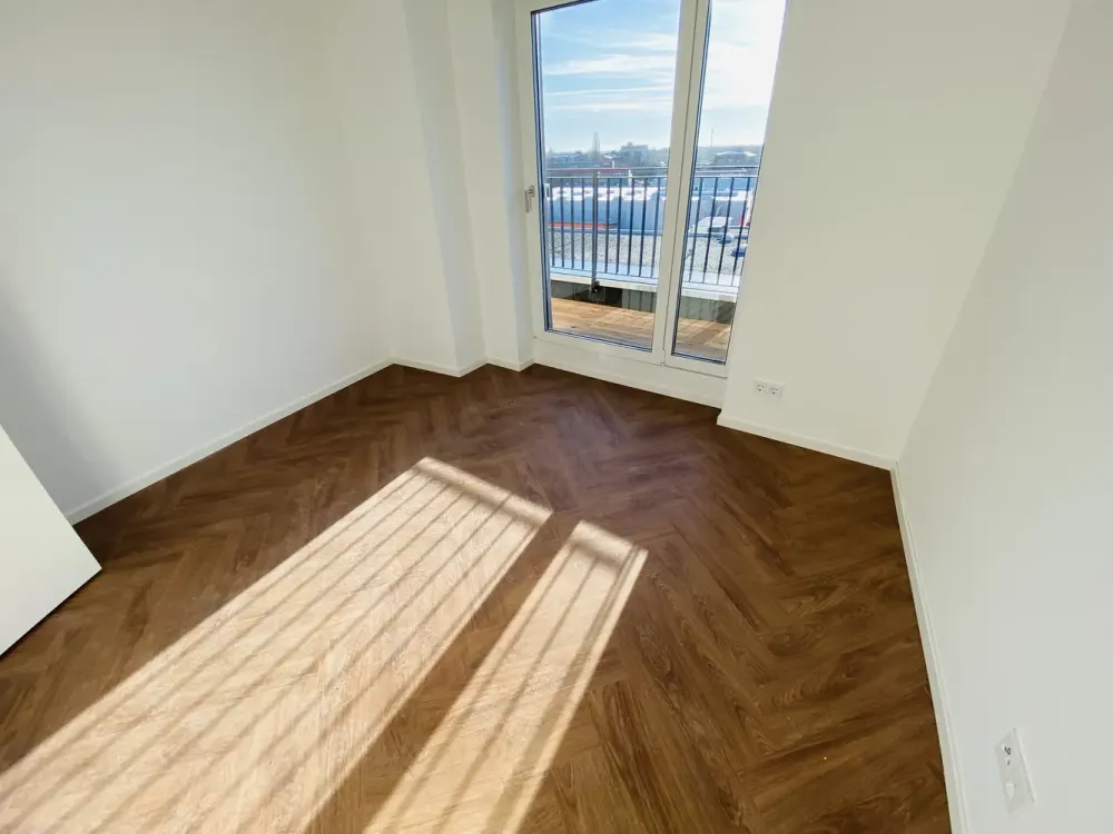 Traumhaftes modernes Wohnen im Dachgeschoss mit EBK und Süd-West-Ost Ausblick!