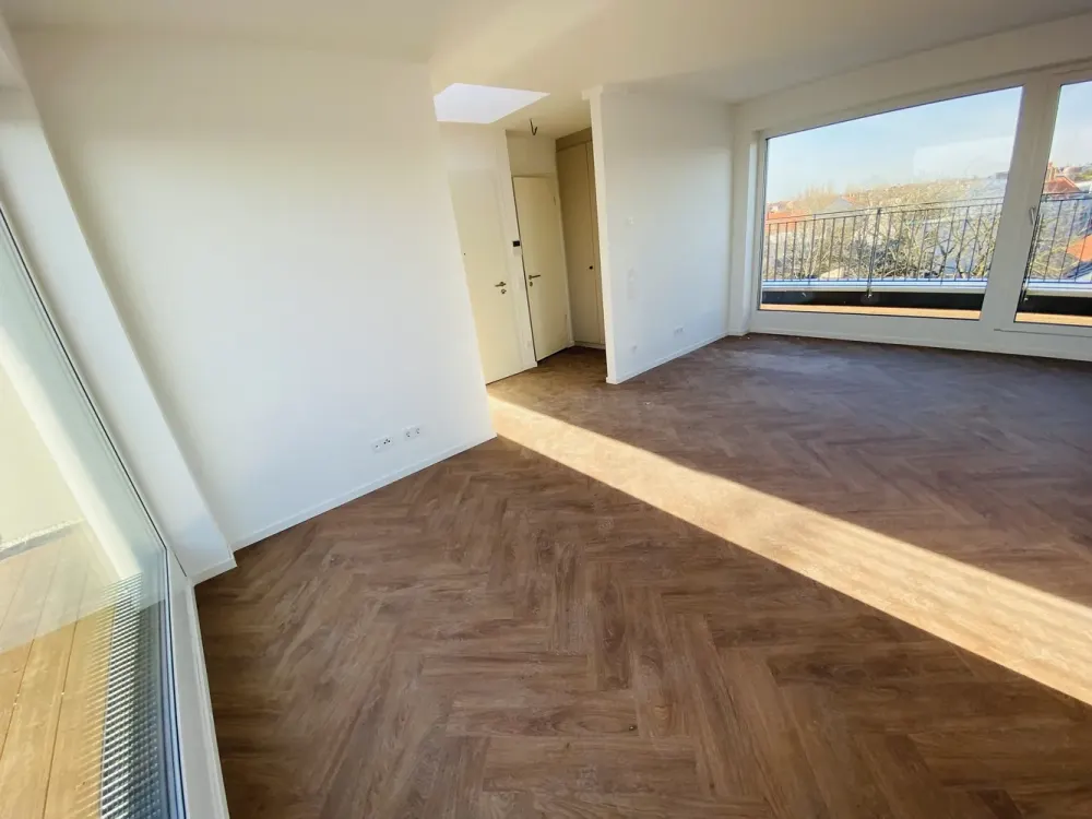 Traumhaftes modernes Wohnen im Dachgeschoss mit EBK und Süd-West-Ost Ausblick!