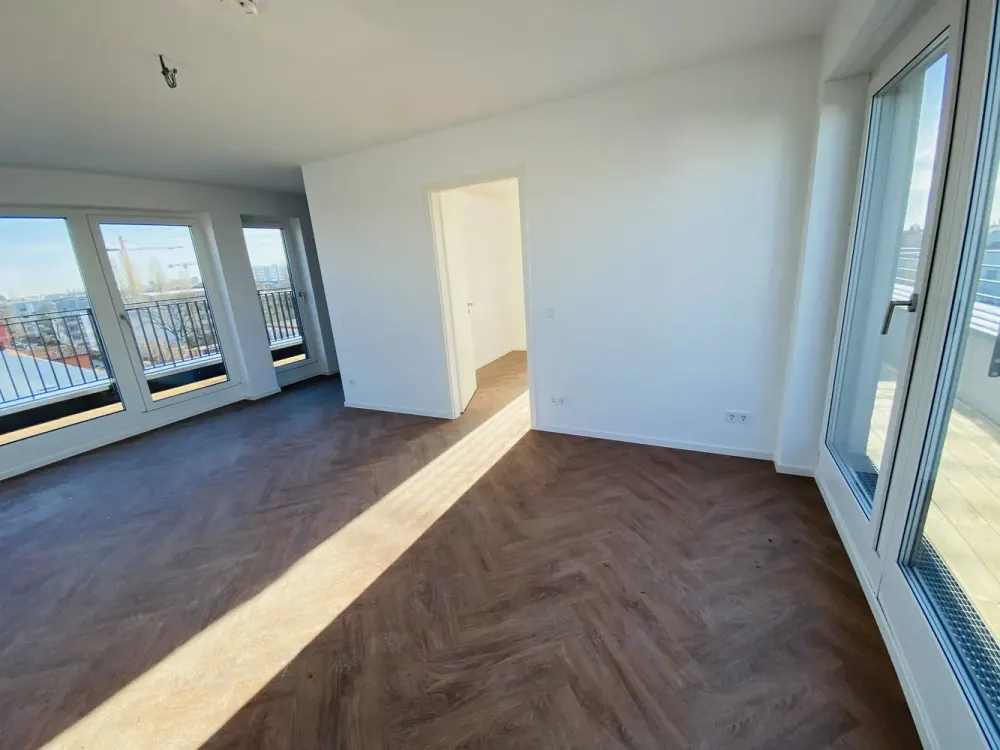Traumhaftes modernes Wohnen im Dachgeschoss mit EBK und Süd-West-Ost Ausblick!
