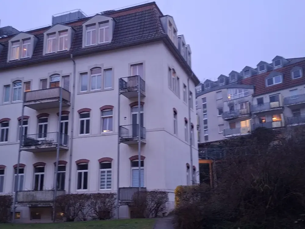 Living with Character: Attic Apartment in Greenery on the Edge of Dresden
