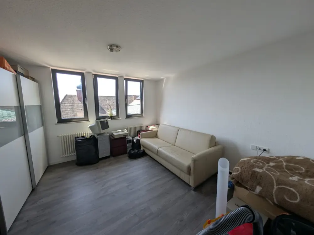 Freie 3 Zimmer DG-Wohnung im Herzen von Holzgerlingen, mit Tiefgaragenplatz