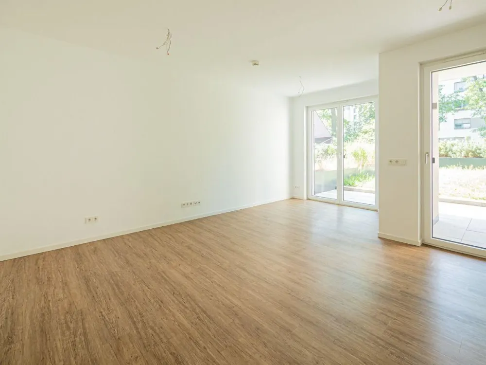 Ruhig aber zentrale Lage. Neubauwohnung mit Terrasse und Garten, FB-Hzg. TG, etc.