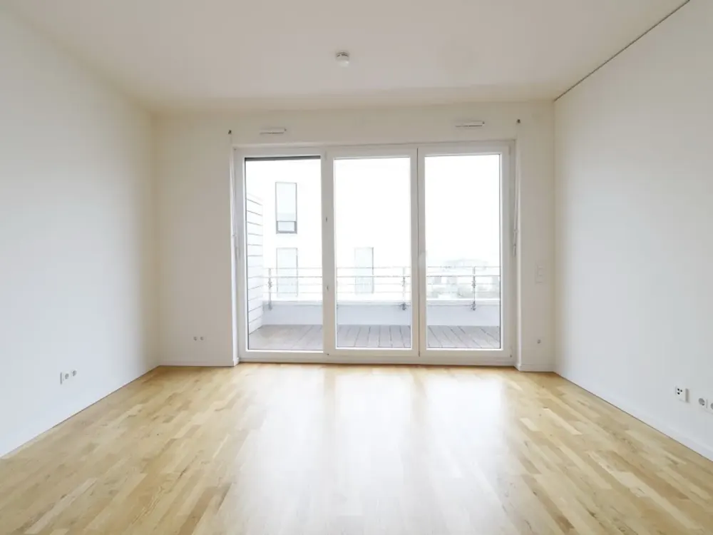 Sonnenverwöhnte 2-Zi-Wohnung mit Balkon, offener Markenküche und Tiefgaragenstellplatz