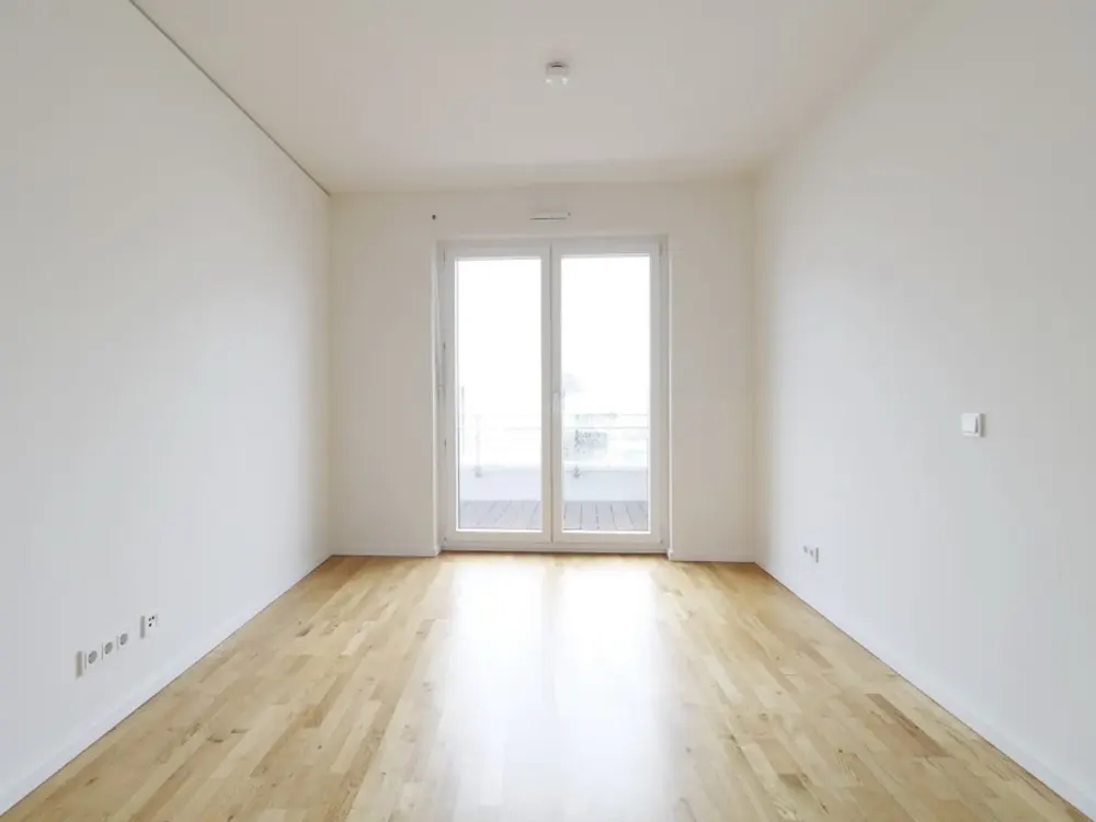Sonnenverwöhnte 2-Zi-Wohnung mit Balkon, offener Markenküche und Tiefgaragenstellplatz