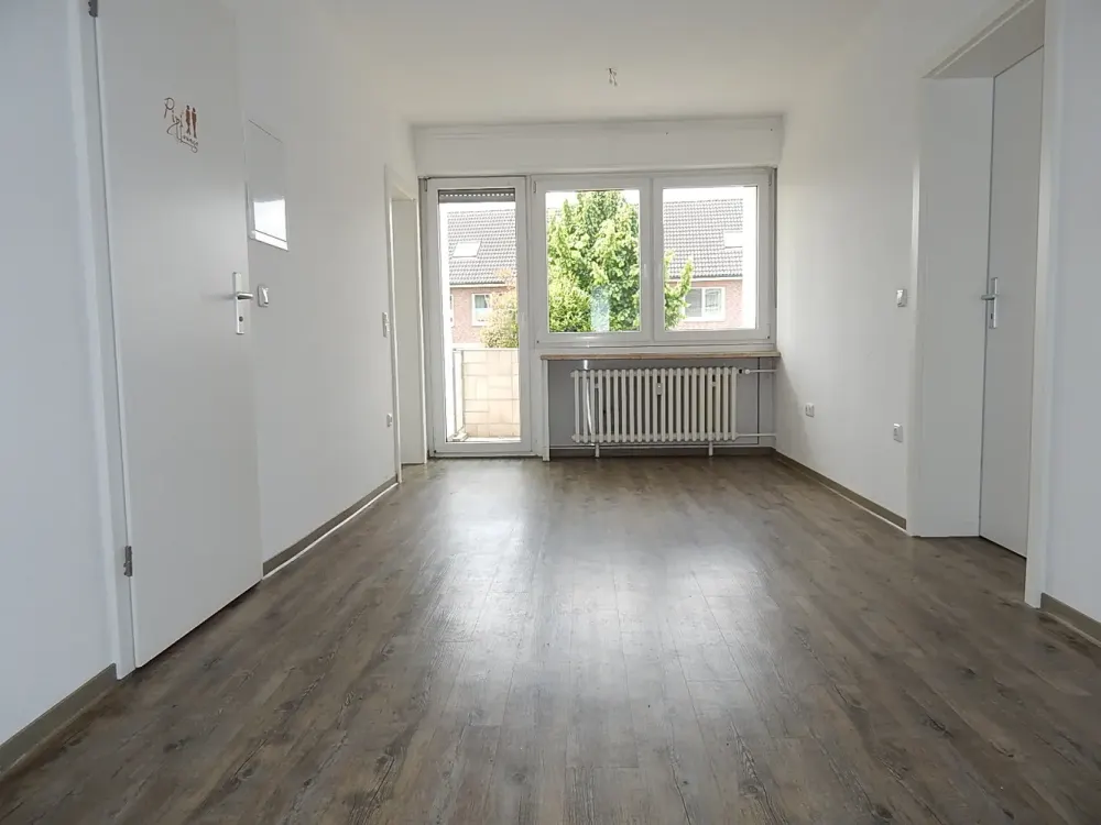 Renovierte 3-Zimmer-EG-Wohnung mit Balkon gefällig!
