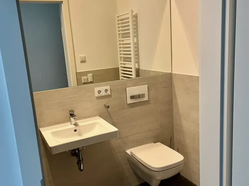 4-Room Apartment with Balcony and Open Fitted Kitchen in New Building in the Heart of Eschborn