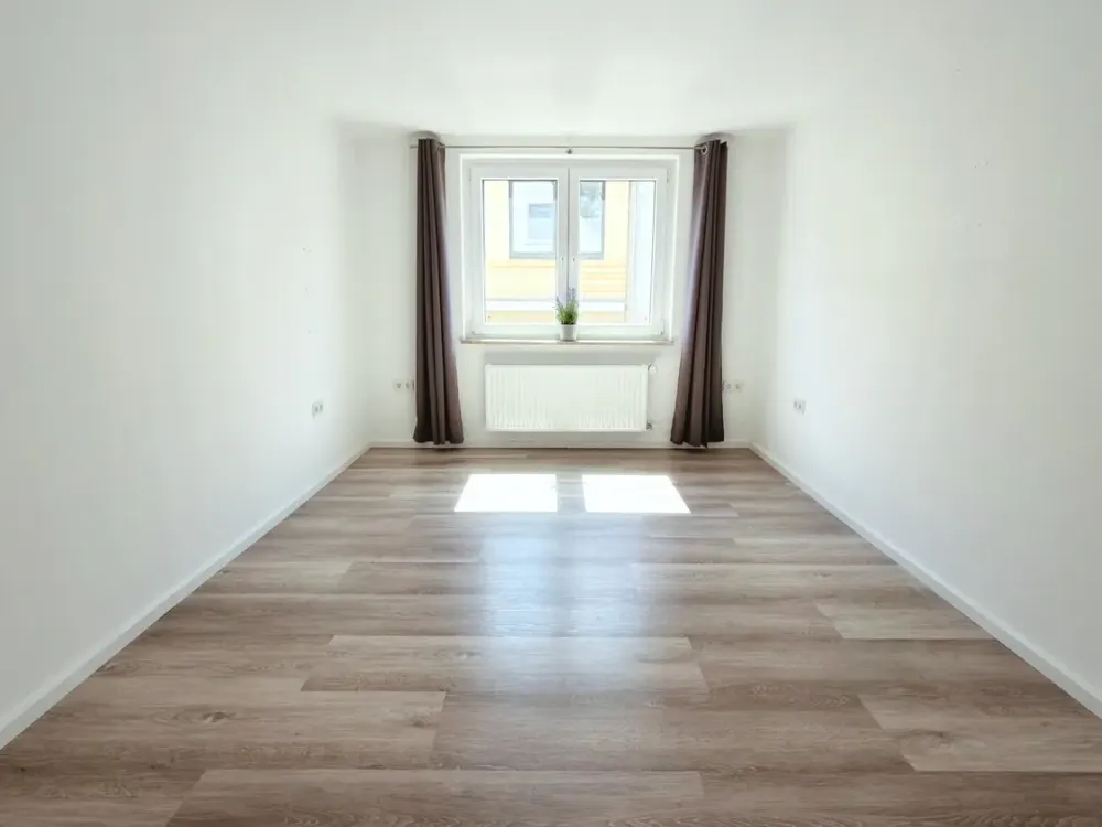 Modernisierte 3-Zimmer-Wohnung mit Einbauküche und Gartenmitbenutzung