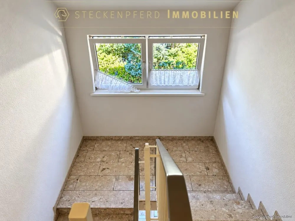 Gemütliche 3-Zimmer-Dachgeschosswohnung mit großem Balkon & Blick ins Grüne